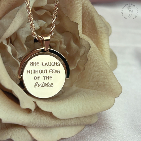 She laughs without fear of the future - Spinning Necklace